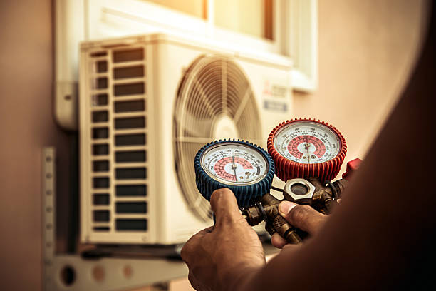 Professional Air Conditioning Service technician working in Whitewright, TX